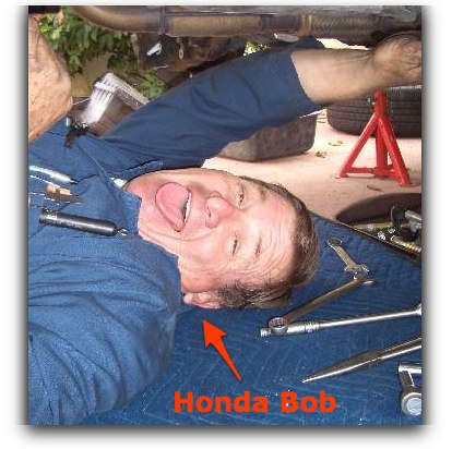 Honday Bob goofing around under a transmission