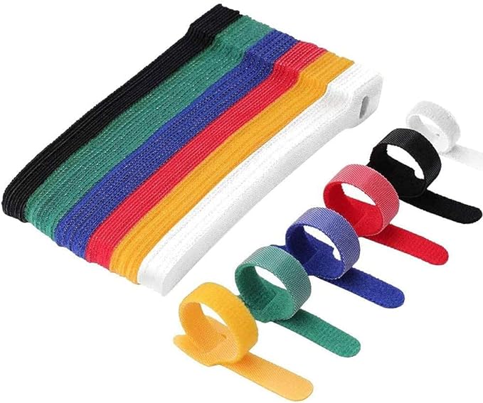 A picture of a block of velcro-like straps, in black, green, blue, red, yellow, and white. There is also one of each colour strap shown looped on itself to show how they wrap cables.