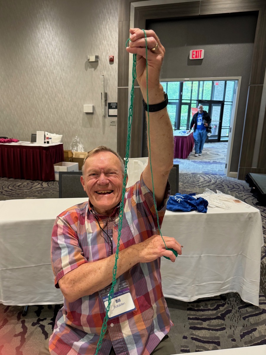 Bill Batalden so proud of his crocheting.