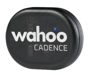 A flat black rectangular pill with semi-circular ends with the words "wahoo CADENCE" and one blue LED light visible above the 'o'