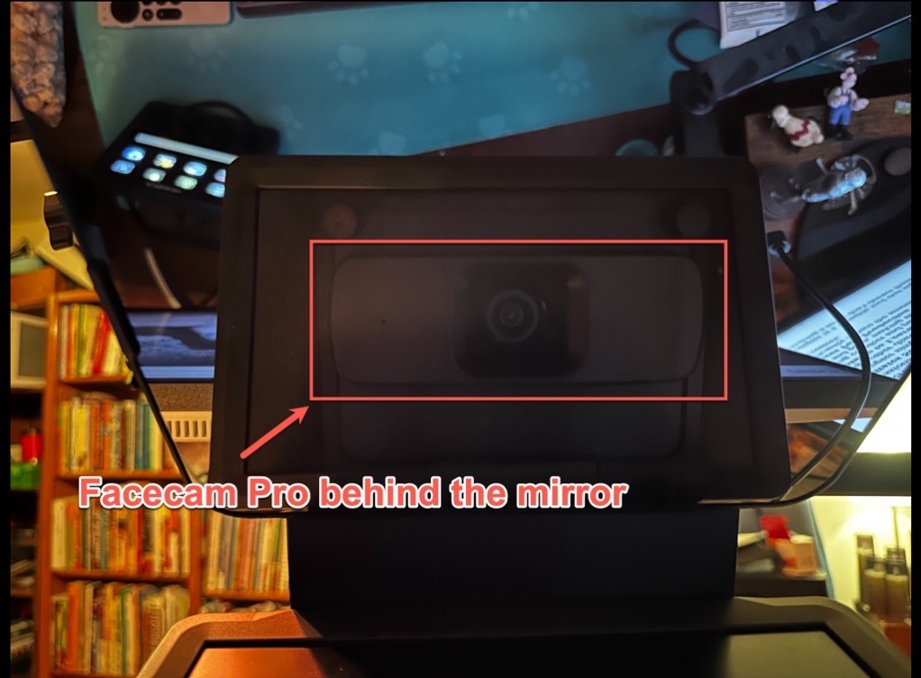 View of prompter with nothing displayed so you can see through to it to the Facecam Pro behind the mirror