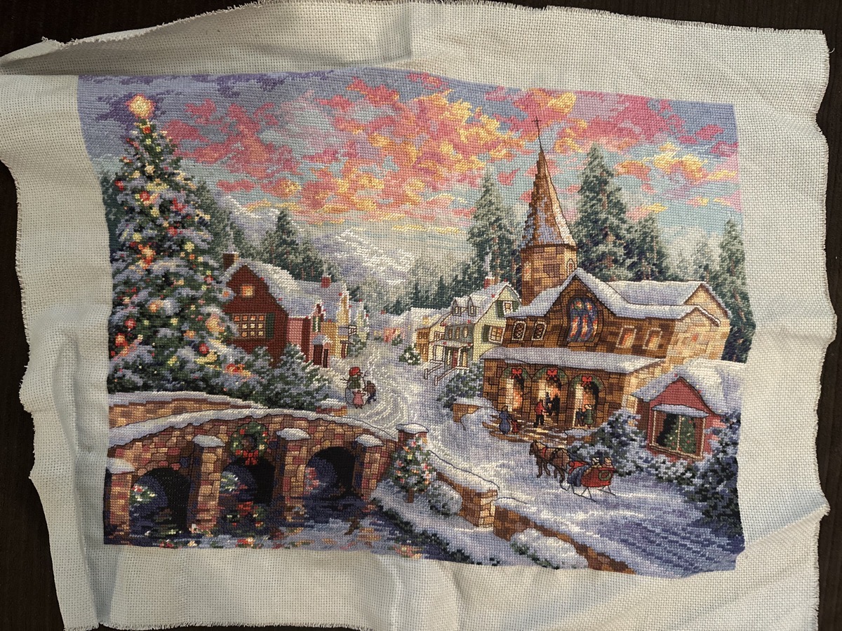 Lindsays complicated Christmas scene cross stitch in progress.