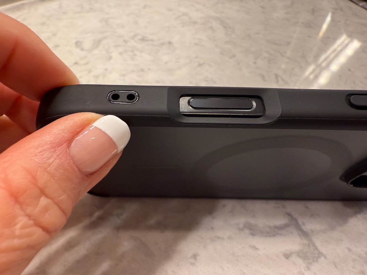 Spigen showing cutaway for camera control and two curious holes.